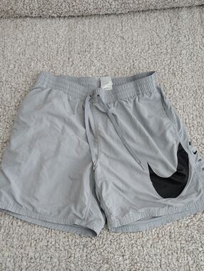 Nike Gray Swim Shorts with Black Swoosh Accent